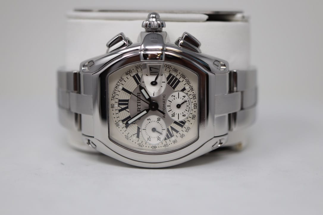 Watchmaker Polishing A Two-Tone Jubilee Bracelet On A Buffing Wheel At Watch Technicians