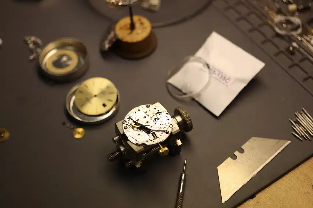 Vintage Watch Movement Secured In Holder During Full Overhaul Service At Watch Technicians Creve Coeur St. Louis